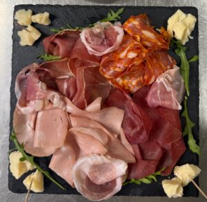 Selection Of Cured Meats And Cheeses
